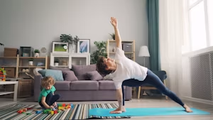 Mother and child doing yoga together at home